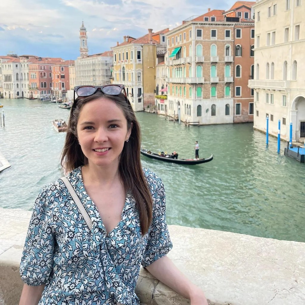 Rachel on a bridge in the city of Venice